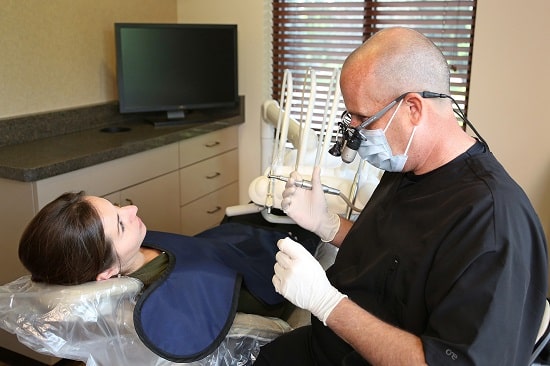 Dr. Lavin performing a procedure on a patient